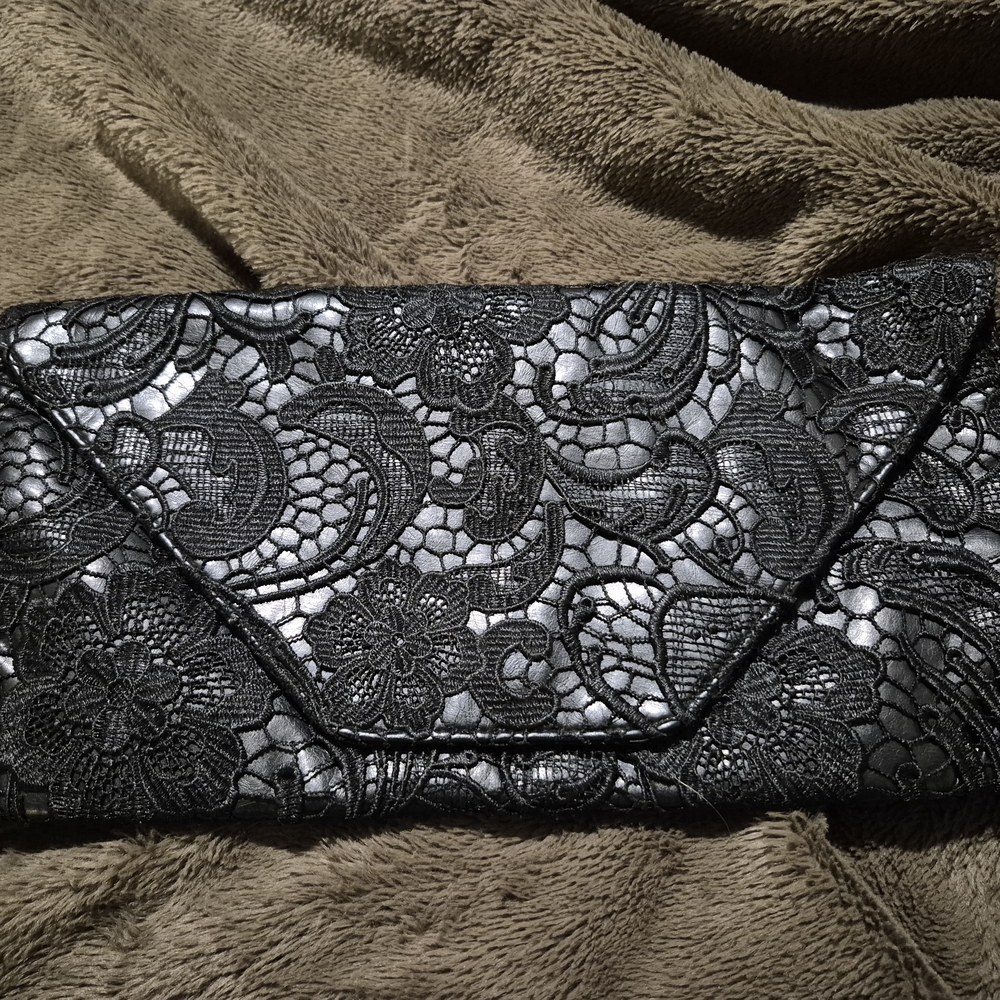 Jessica Simpsob Elegant Black Lace Clutch